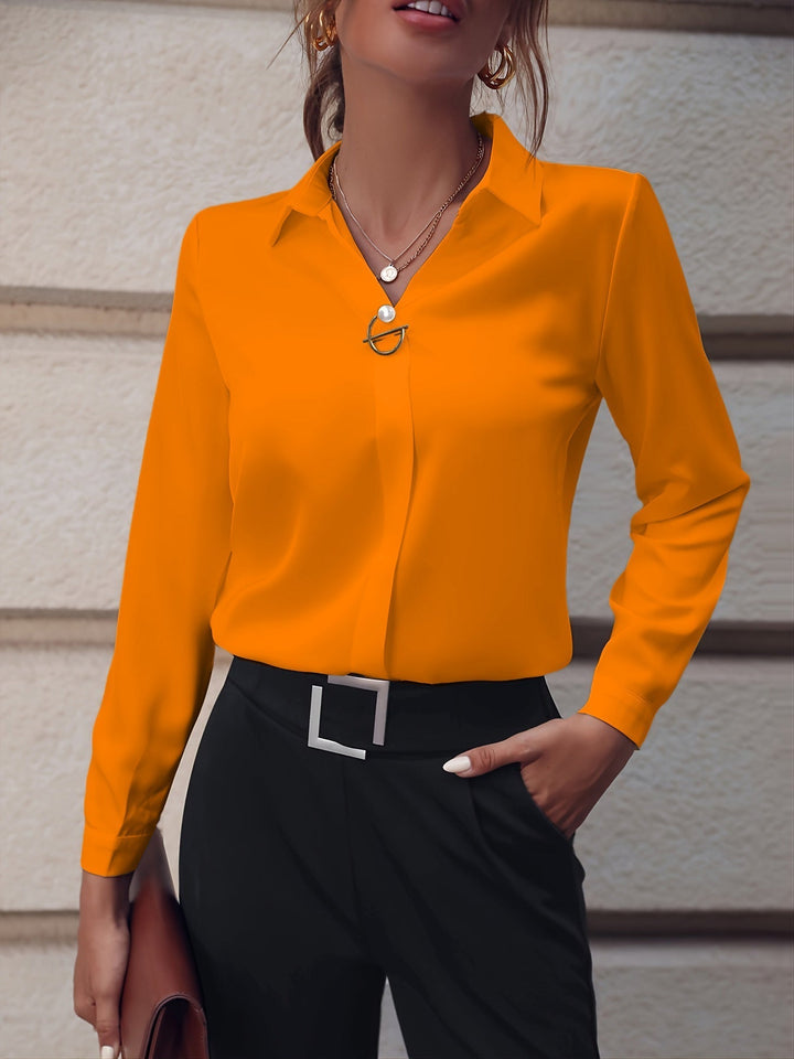 Women’s Elegant Blouse with Decorative Fastening