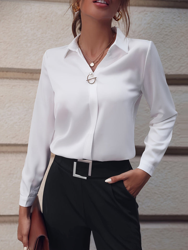 Women’s Elegant Blouse with Decorative Fastening