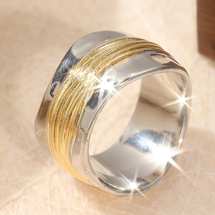 Sculptural Silver Ring with Golden Thread Accents