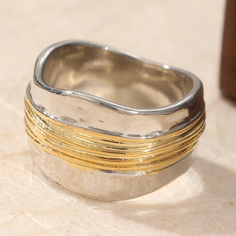 Sculptural Silver Ring with Golden Thread Accents
